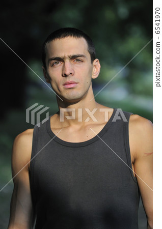 young casual man outdoor portrait smiling young casual man outdoor portrait smiling 6541970