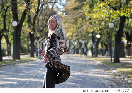 Cute young woman smiling Cute young woman smiling 6541977