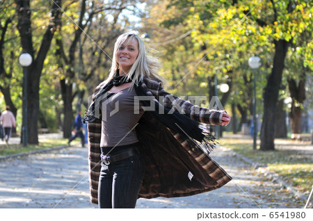 Cute young woman smiling Cute young woman smiling 6541980