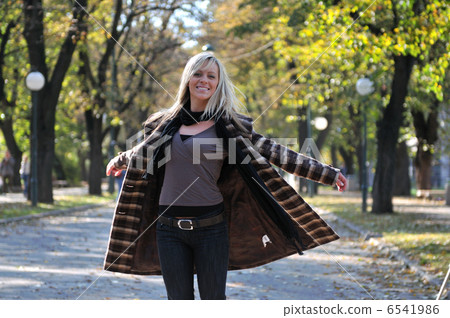 Cute young woman smiling Cute young woman smiling 6541986