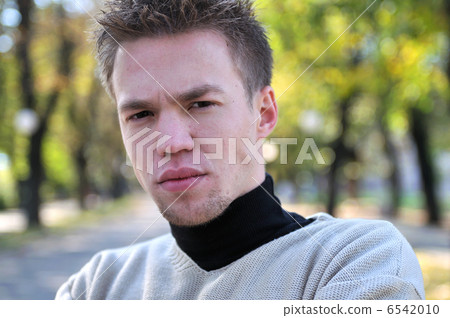happy young casual man outdoor portrait posing happy young casual man outdoor portrait posing 6542010
