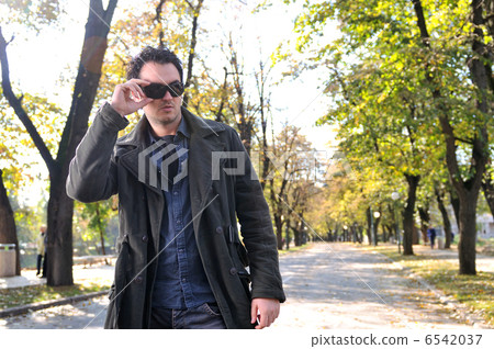 happy young casual man outdoor portrait posing happy young casual man outdoor portrait posing 6542037