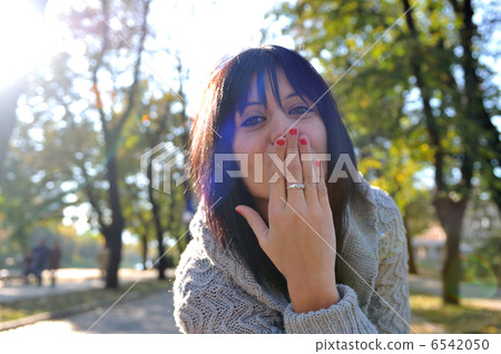 brunette Cute young woman posing outdoors brunette Cute young woman posing outdoors 6542050