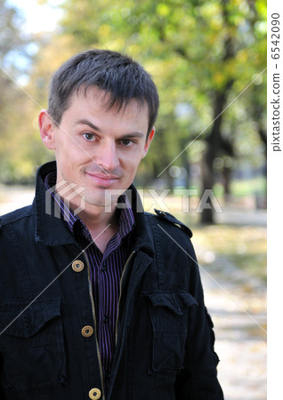 happy young casual man outdoor portrait posing happy young casual man outdoor portrait posing 6542090