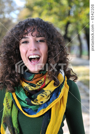brunette Cute young woman smiling brunette Cute young woman smiling 6542108