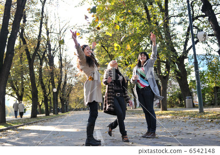 Three young ladies enjoying themselves Three young ladies enjoying themselves 6542148