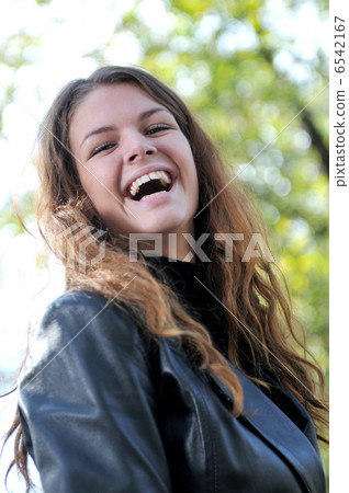 Happy young woman smiling Happy young woman smiling 6542167