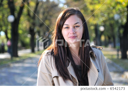 Cute young woman smiling Cute young woman smiling 6542173
