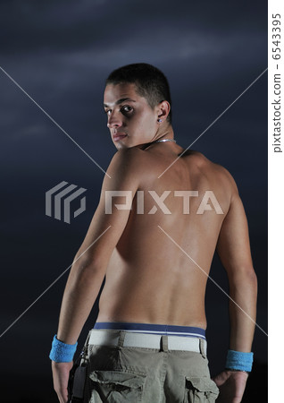 young man dancing and jumping on top of the building young man dancing and jumping on top of the building 6543395