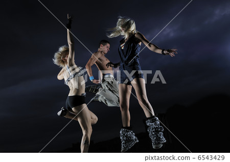 teens jumping in air ready for party 6543429