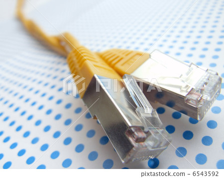 yellow ethernet cable on dotted background 6543592