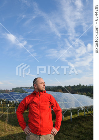 Male solar panel engineer at work place 6544289
