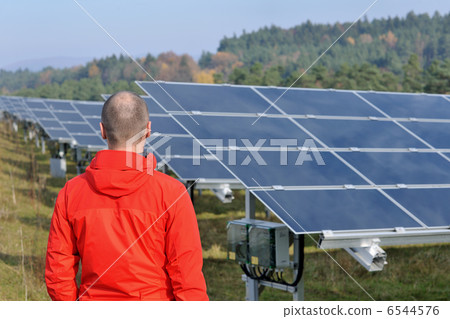 Male solar panel engineer at work place 6544576