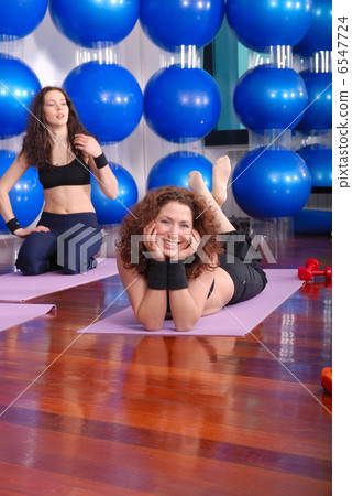 happy girl in fitness studio happy girl in fitness studio 6547724