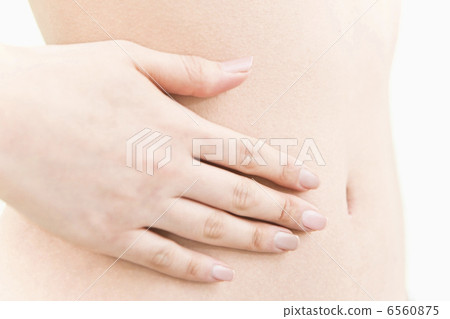 Hand of a woman's hand on her stomach Hand of a woman's hand on her stomach 6560875