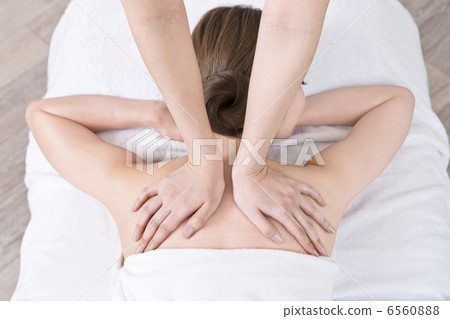 A woman undergoing body treatment 6560888