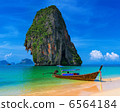 Thailand exotic tropical beach. Blue sky, sand and traditional b 6564184