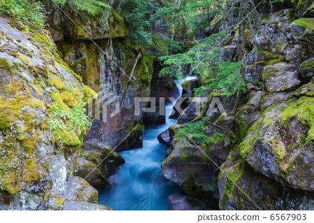 Waterfall in forest 6567903