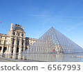 The glass pyramid of the Louvre museum 6567993