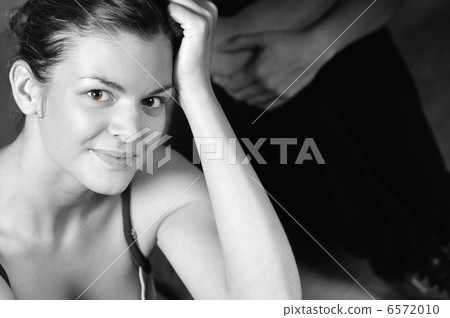 young woman practicing fitness and working out 6572010