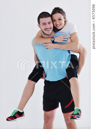 happy young couple fitness workout and fun happy young couple fitness workout and fun 6573096