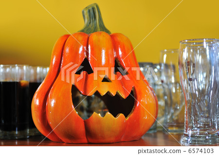 helloween party pumpkin and wine glasses close up helloween party pumpkin and wine glasses close up 6574103