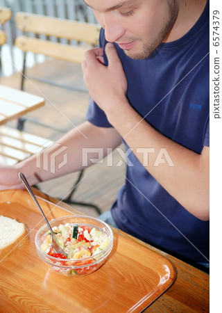 man eating healthy food it an restaurant man eating healthy food it an restaurant 6574379