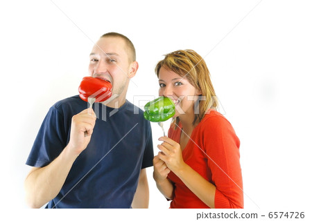 happy couple with peppers isolated 6574726