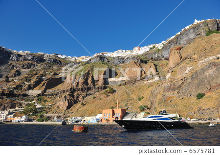 santorini island coast with luxury yacht 6575781