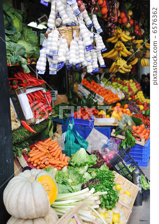 fresh fruits and vegetables at market 6576362