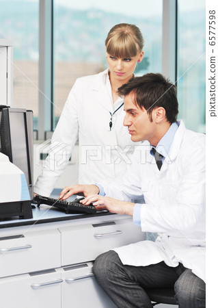 science people in bright lab science people in bright lab 6577598