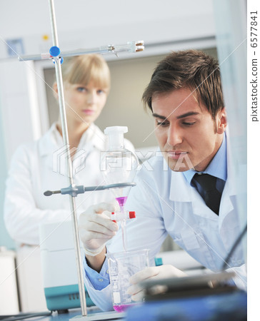 science people in bright lab science people in bright lab 6577841
