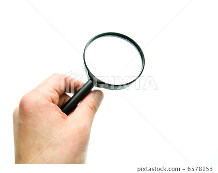 hand with magnifying glass 6578153