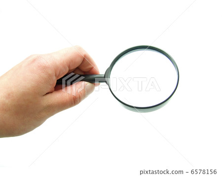 hand with magnifying glass hand with magnifying glass 6578156