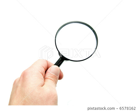 hand with magnifying glass hand with magnifying glass 6578162