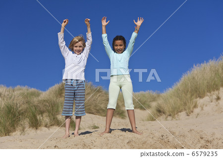 Happy Children, Boy & Girl, Playing At Beach 6579235