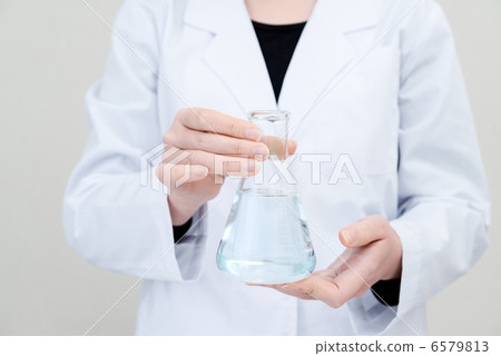 A lady with a flask with a flask 6579813