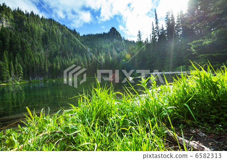 Lake in mountains 6582313