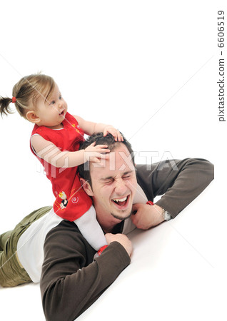 young father play with beautiful daughter young father play with beautiful daughter 6606519