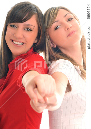two young girls isolated on white two young girls isolated on white 6606524