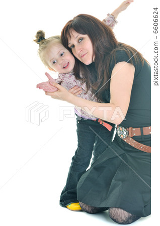mother and littler girl isolated mother and littler girl isolated 6606624