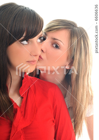 two young girls isolated on white 6606636