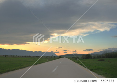 countryroad adventure with beautiful sunset 6606775