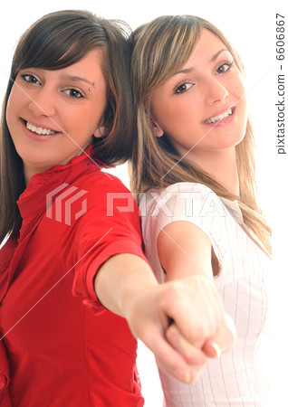 two young girls isolated on white two young girls isolated on white 6606867