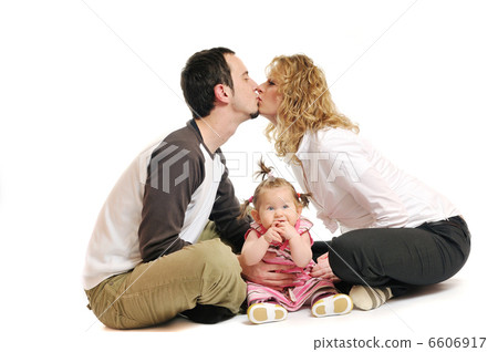 happy young family together in studio 6606917
