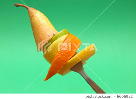 sliced fruits on fork sliced fruits on fork 6606982