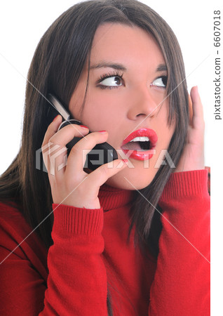 woman in red talking on cellphone woman in red talking on cellphone 6607018