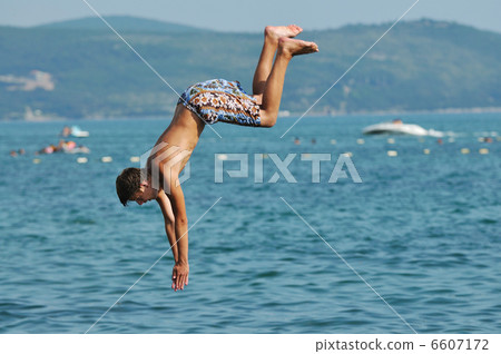 boy jump sea boy jump sea 6607172