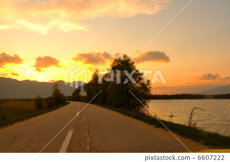 countryroad adventure with beautiful sunset 6607222
