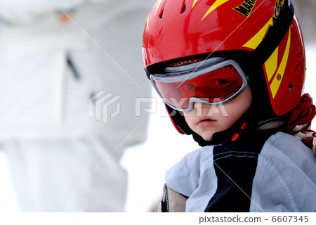 Little skier with helmet and goggles Little skier with helmet and goggles 6607345